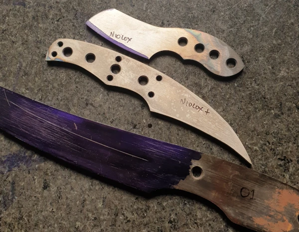 Knife blanks with their steel type written on them