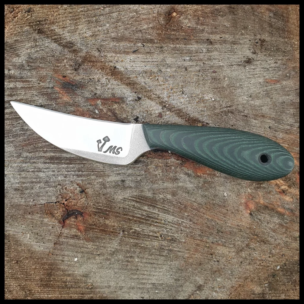 A custom knife order for my Talon model with a green micarta handle